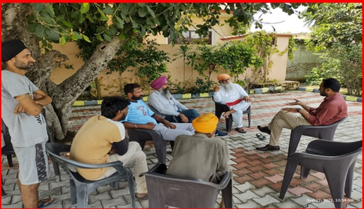 Community Meeting at a Village -1.PNG