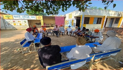 Meeting with farmers at a Village.jpg